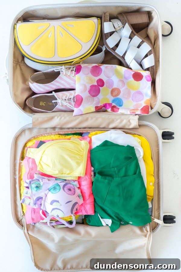 Pack a Carry-On Like a Pro: Smart Tips for Stress-Free Travel 16 Suitcase with clothes in it