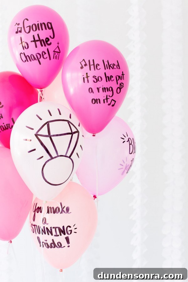 Balloon Wishes Ideas for the Bride-to-Be: Creative Bridal Shower Decor 11 Pink balloons with words on them