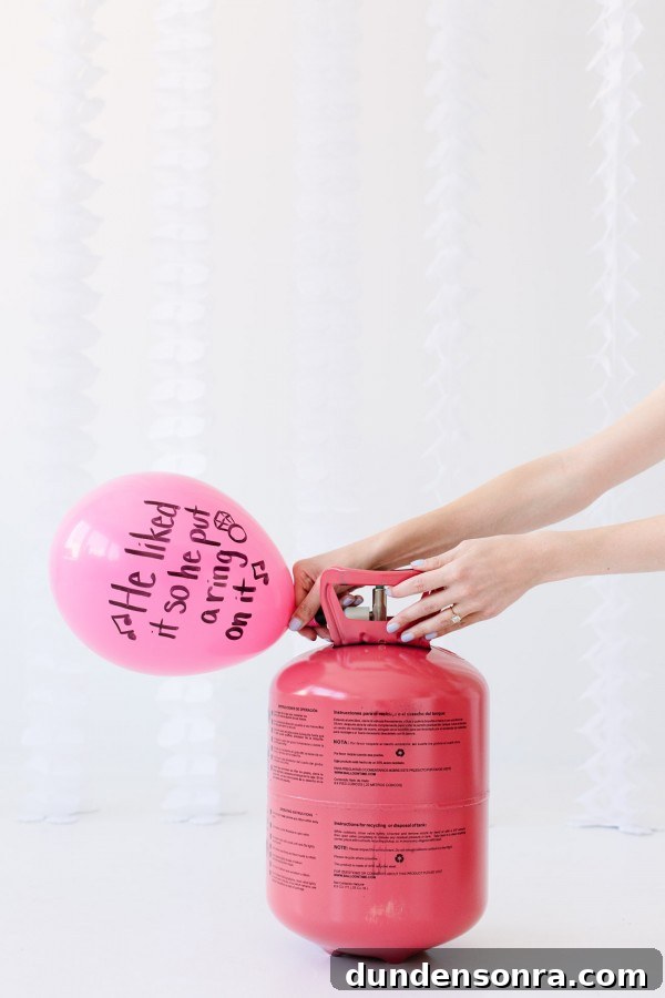 Balloon Wishes Ideas for the Bride-to-Be: Creative Bridal Shower Decor 8 Someone blowing up a balloon