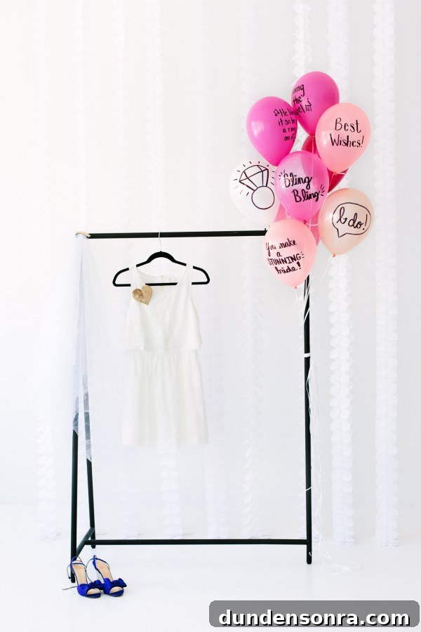 Balloon Wishes Ideas for the Bride-to-Be: Creative Bridal Shower Decor 9 A dressing rack and pink balloons