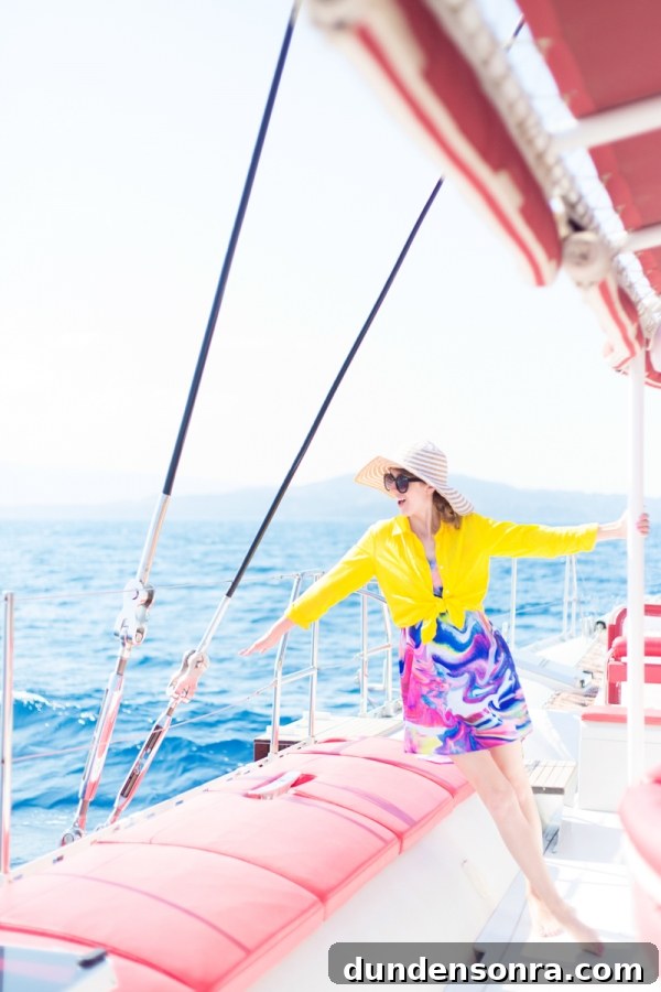 Honeymoon in Santorini: Meet the Mindells' Romantic Getaway 19 A woman wearing a yellow shirt on a boat