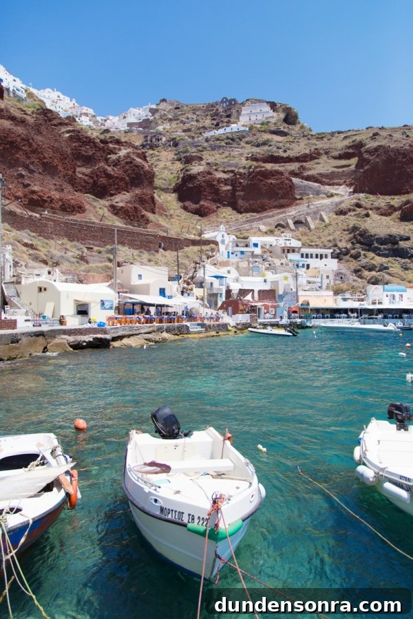 Honeymoon in Santorini: Meet the Mindells' Romantic Getaway 21 Boats and buildings on the coast