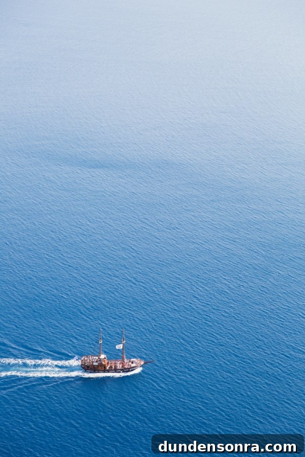 Honeymoon in Santorini: Meet the Mindells' Romantic Getaway 33 A boat on the sea