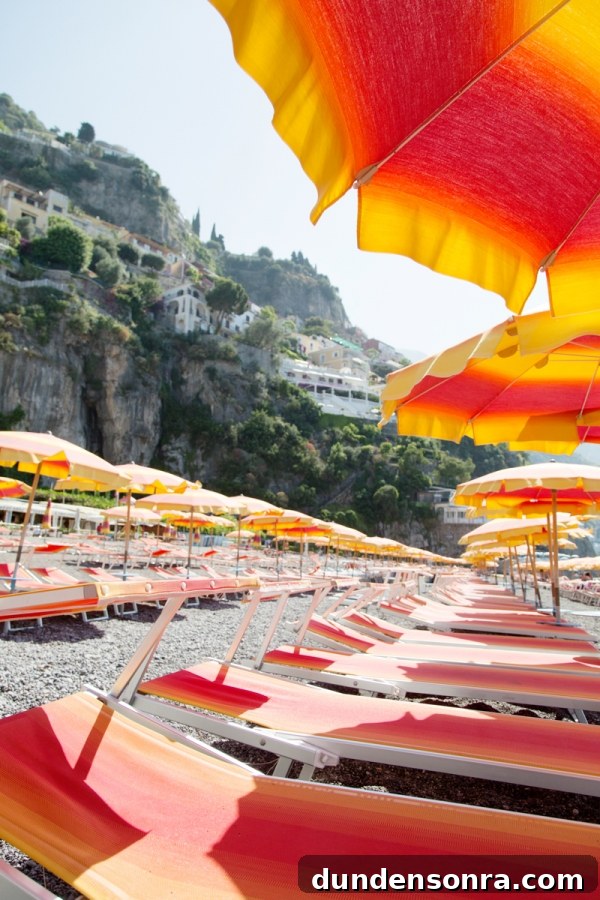 Honeymoon in Amalfi Coast: Our Romantic Italian Escape 15 Orange chairs with umbrellas