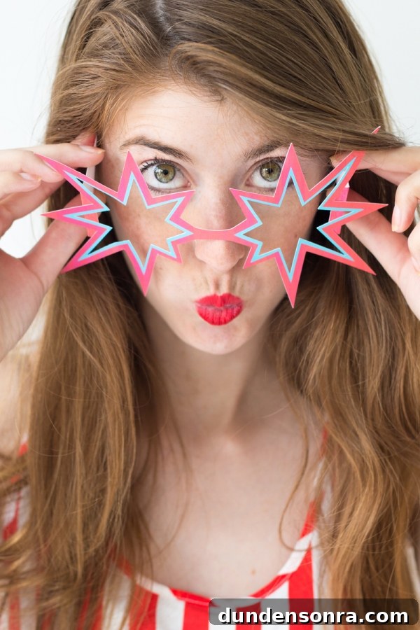 A woman with star sunglasses on