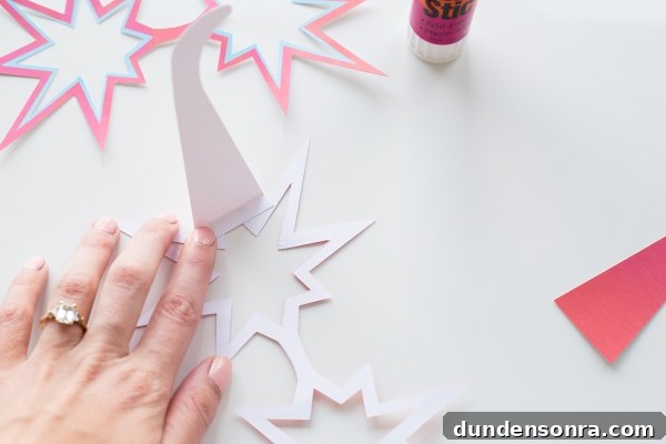 Someone folding paper