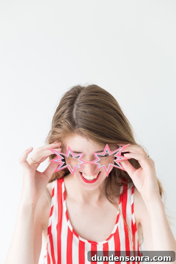 A woman wearing star sunglasses