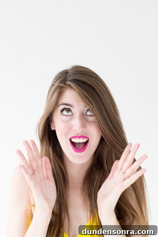 How to Make Your Lipstick Last All Day: 2 Proven Methods 14 A woman posing for the camera