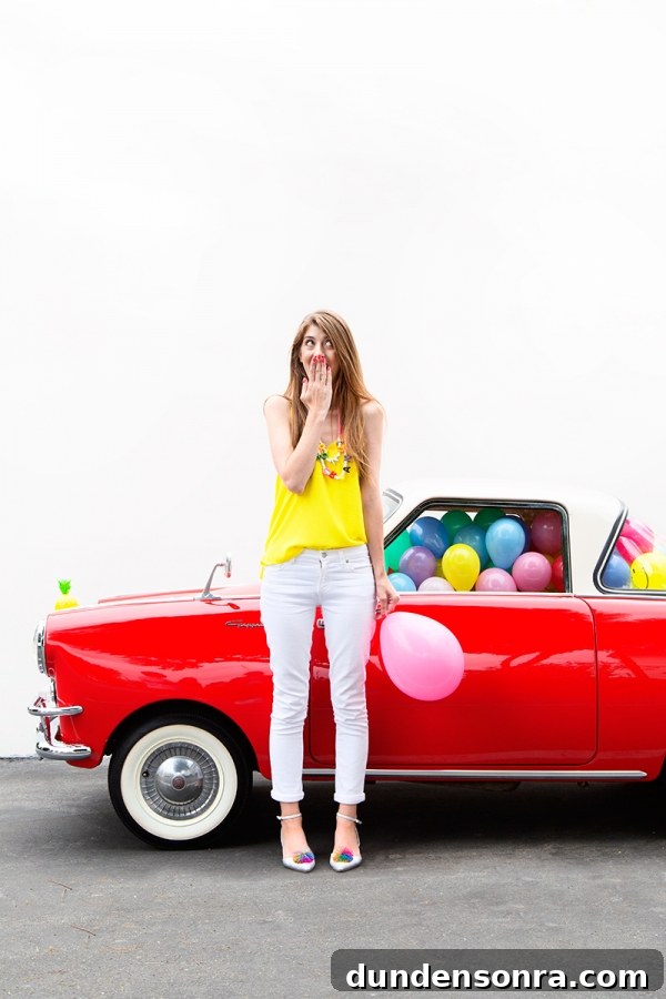DIY Funky Hood Ornaments: Creative Ideas and How to Make Them 4 A woman standing next to a red car with balloons in it