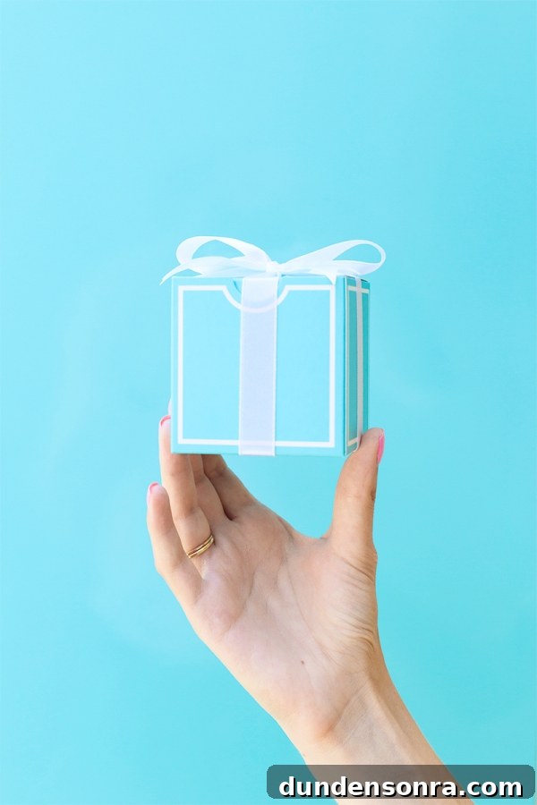 Sugarfina Pasadena: Where to Buy Luxury Candy in Pasadena 12 Someone holding a box with a bow on it