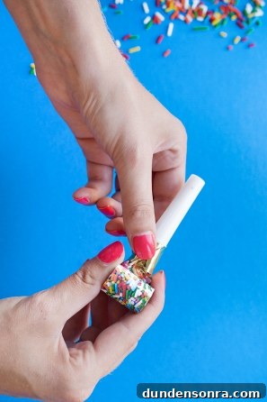 Someone holding party favors