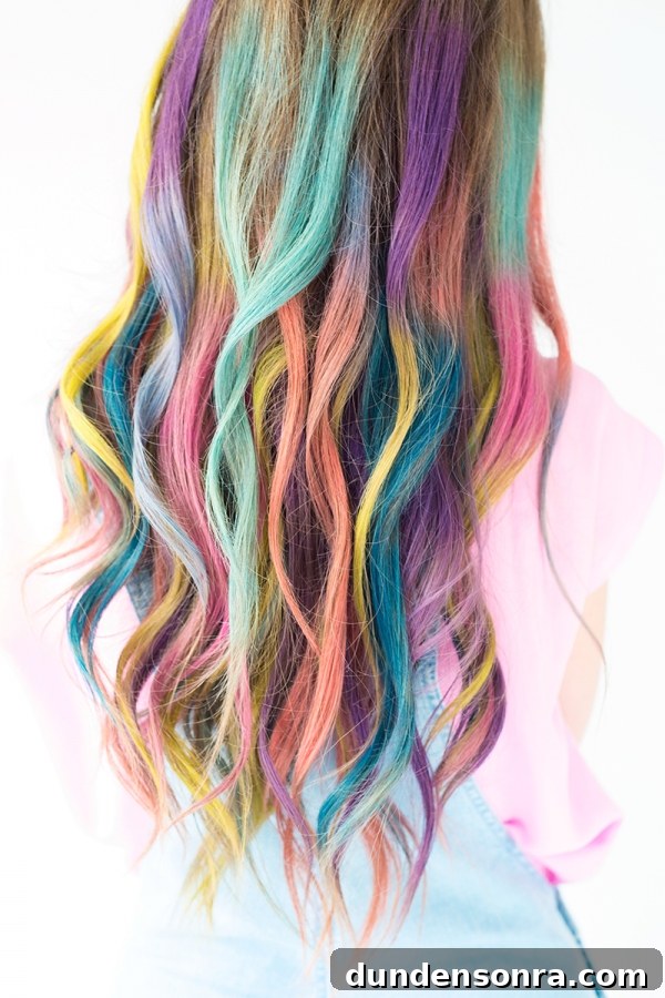 A close up of a person with rainbow hair