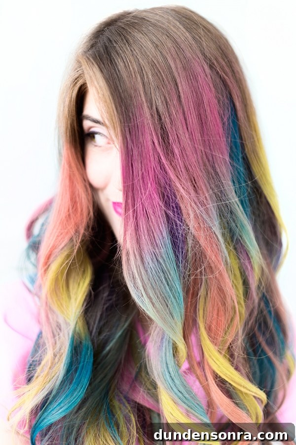 A close up of a woman with colorful hair