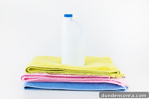Towels and a bottle of bleach 