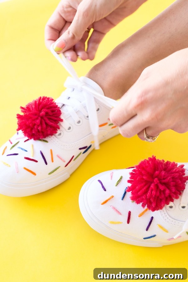 DIY Ice Cream Sneakers: How to Paint and Customize Your Shoes 16 White sneakers with rainbow string and red pom poms