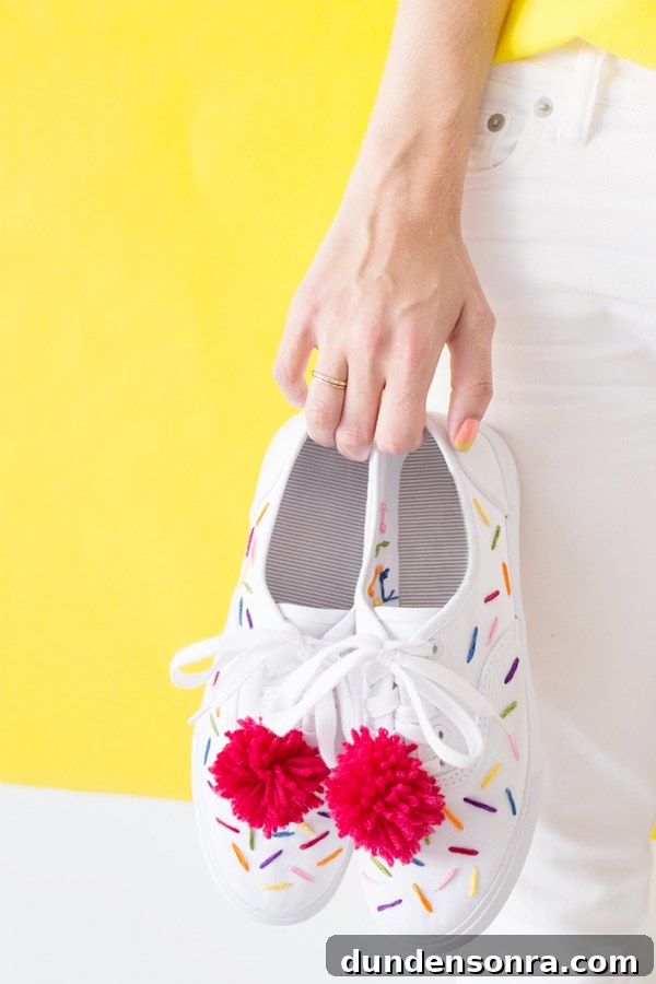 DIY Ice Cream Sneakers: How to Paint and Customize Your Shoes 17 Someone holding white sneakers