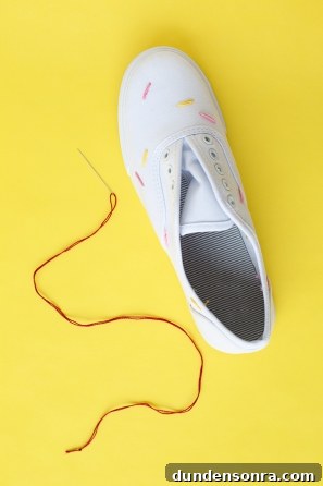 White sneakers and red string