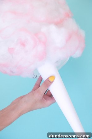 How to Make a Cotton Candy Piñata for Parties and Birthdays 12 White paper and pink cotton
