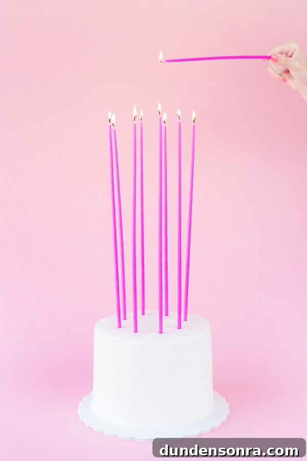 Pink candles on a cake