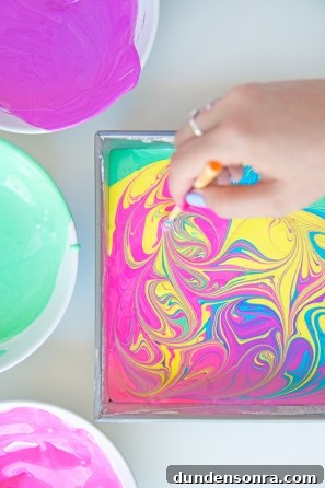 Someone mixing paint 