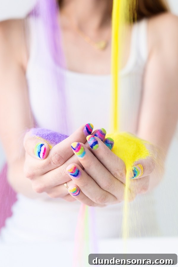 Someone holding rainbow powder