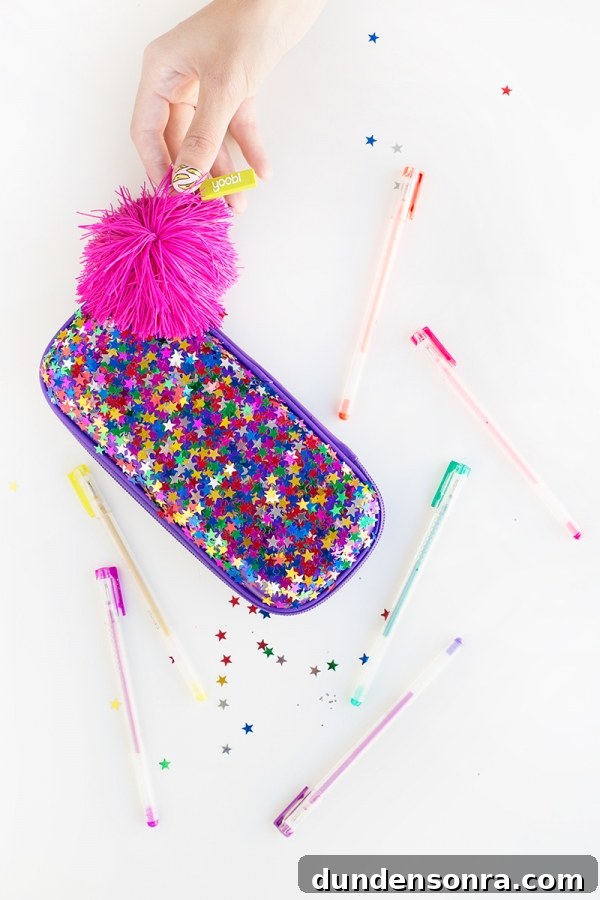 Pencil case with glitter and pens