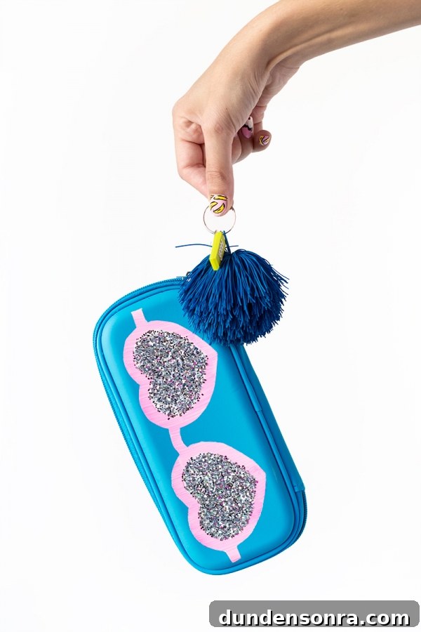 A blue Pencil Case with tassels