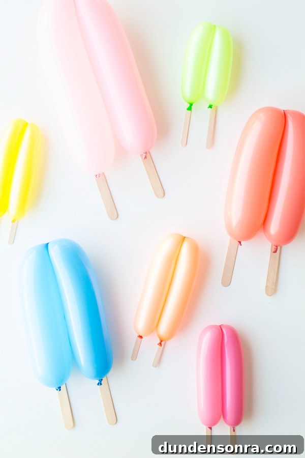 Summer Dreamsicle Party Ideas for a Bright, Refreshing Bash 3 Colorful popsicle balloons