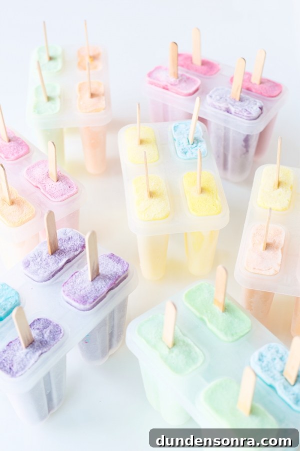 Summer Dreamsicle Party Ideas for a Bright, Refreshing Bash 5 Someone making colorful popsicles