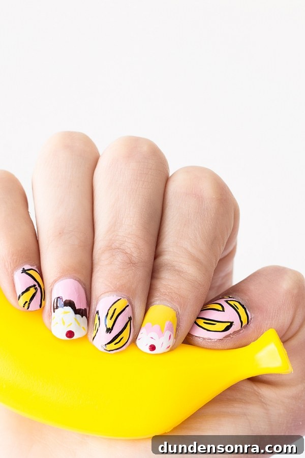 Banana Split Nail Art Ideas: Fun DIY Manicure Designs 10 Someone with pink and yellow nails