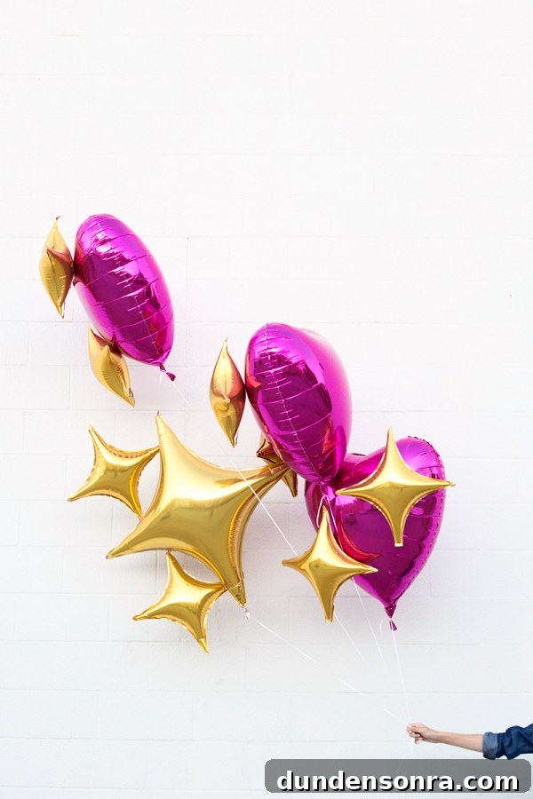 Pink heart and star emoji balloons