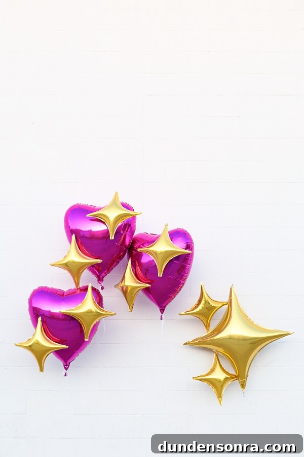 Pink heart and star emoji balloons