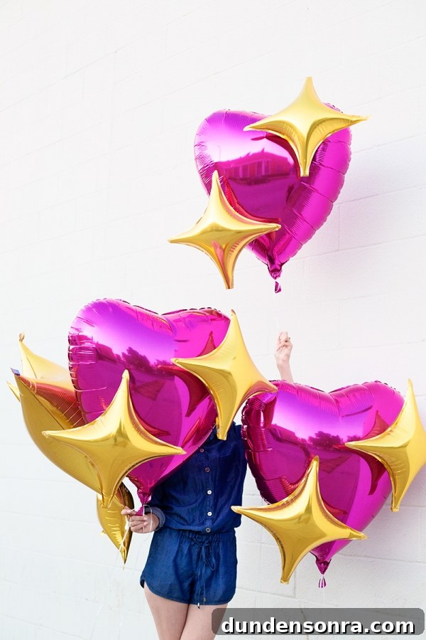 Pink heart and star emoji balloons