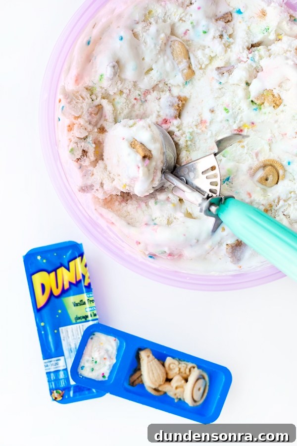 Someone scooping dunkaroo ice cream