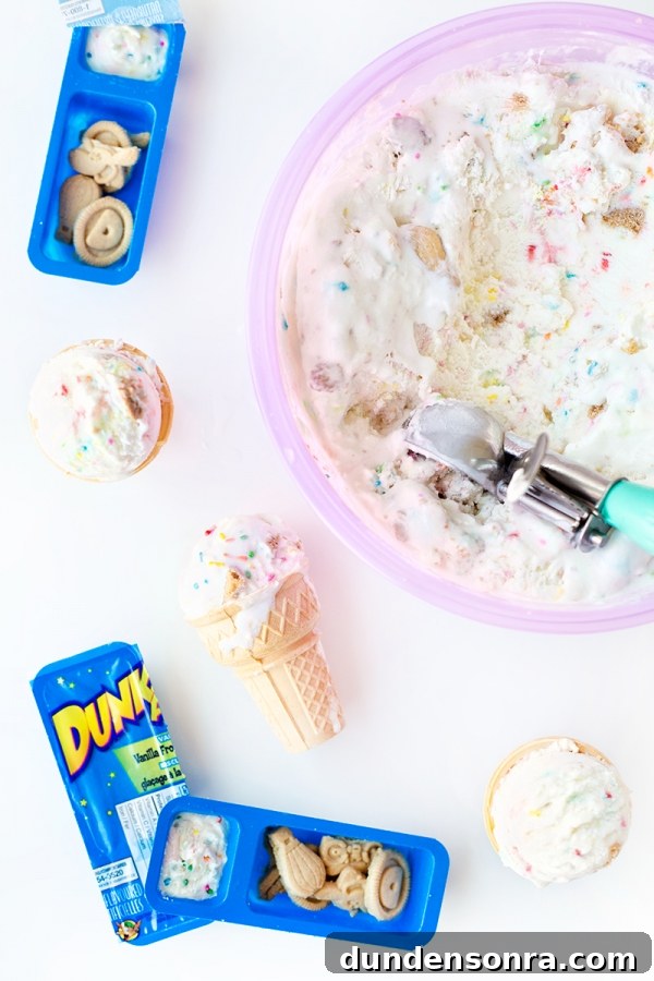 Dunkaroos Ice Cream Review: Nostalgic Throwback Treats to Try 7 Someone scooping dunkaroo ice cream