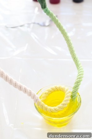Someone dying a rope green