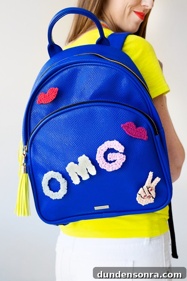 A blue backpack that says "OMG"