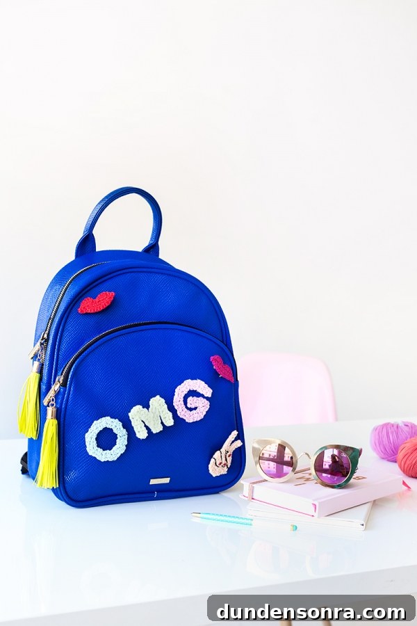 A blue backpack that says "OMG"