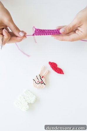 Someone crocheting little items 