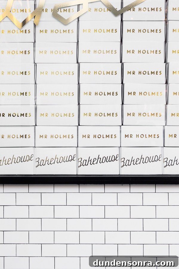Mr. Holmes Bakehouse: Signature Sugar Creations You Can't Miss 7 Stacks of boxes that say "Mr. Holmes" on them