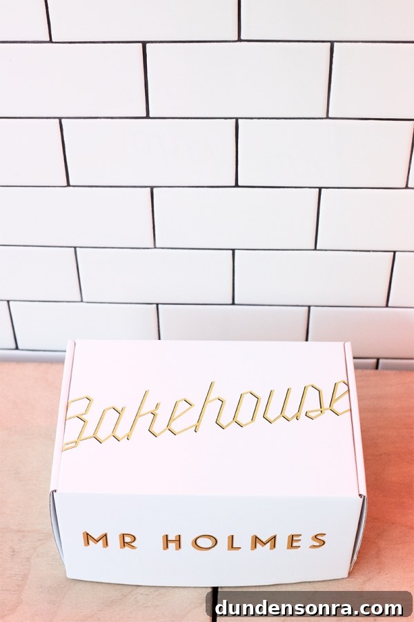 Mr. Holmes Bakehouse: Signature Sugar Creations You Can't Miss 9 A box that says "bakehouse" on it