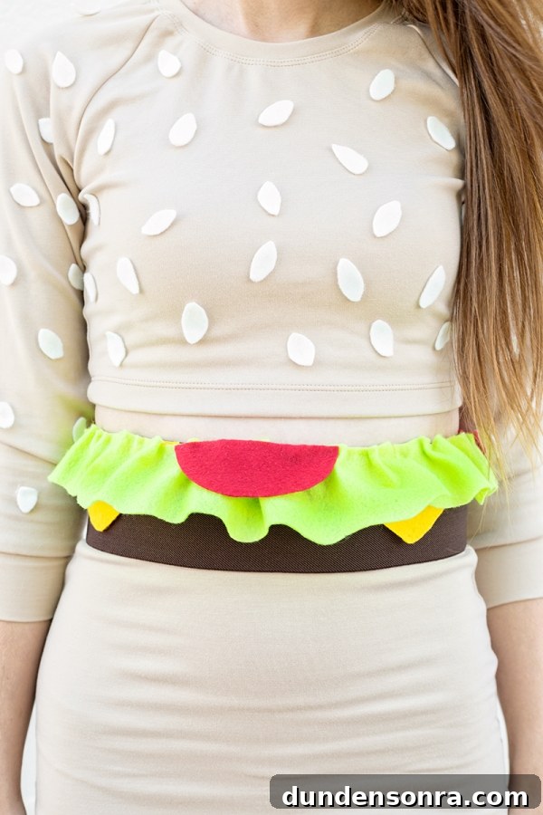 DIY Burger Costume Ideas: Creative Homemade Burger Halloween Outfit 3 A close up of a woman in a burger costume