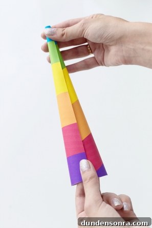 Someone holding a colorful paper