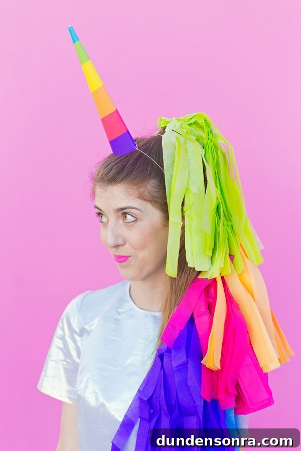 DIY Lisa Frank Costume Ideas for Colorful 90s-Inspired Looks 14 A woman dressed in a unicorn costume