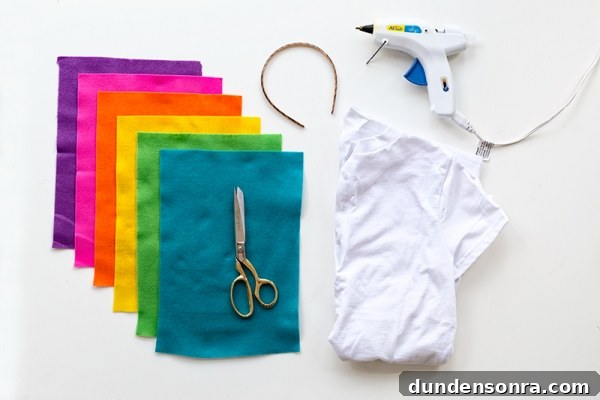 DIY Lisa Frank Costume Ideas for Colorful 90s-Inspired Looks 16 Rainbow papers, a shirt, and a glue gun