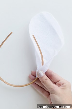 Someone holding a headband