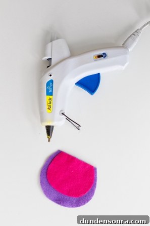 DIY Lisa Frank Costume Ideas for Colorful 90s-Inspired Looks 28 Glue gun and colorful paper