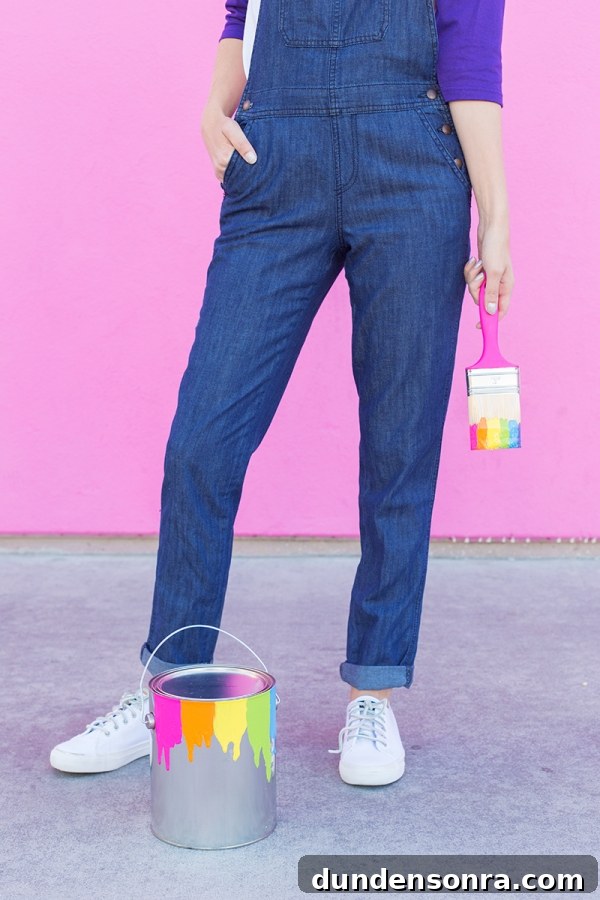 DIY Lisa Frank Costume Ideas for Colorful 90s-Inspired Looks 32 A close up of someones jeans and a rainbow paint brush