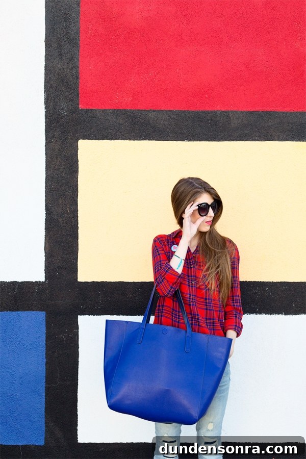 Plaid You at Hello: Two Fall Plaid Outfits from Target 4 A woman standing in front of a colorful wall