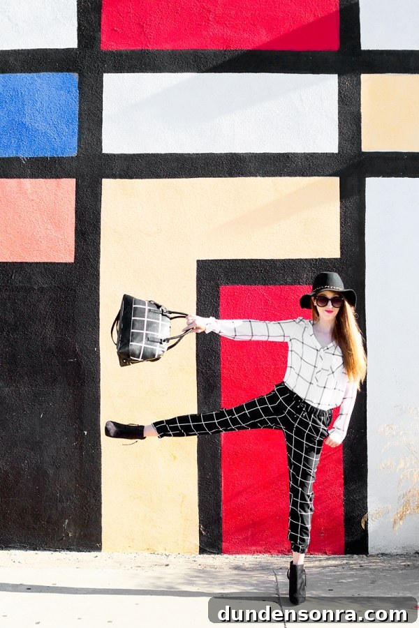 Plaid You at Hello: Two Fall Plaid Outfits from Target 10 A woman standing in front of a colorful wall